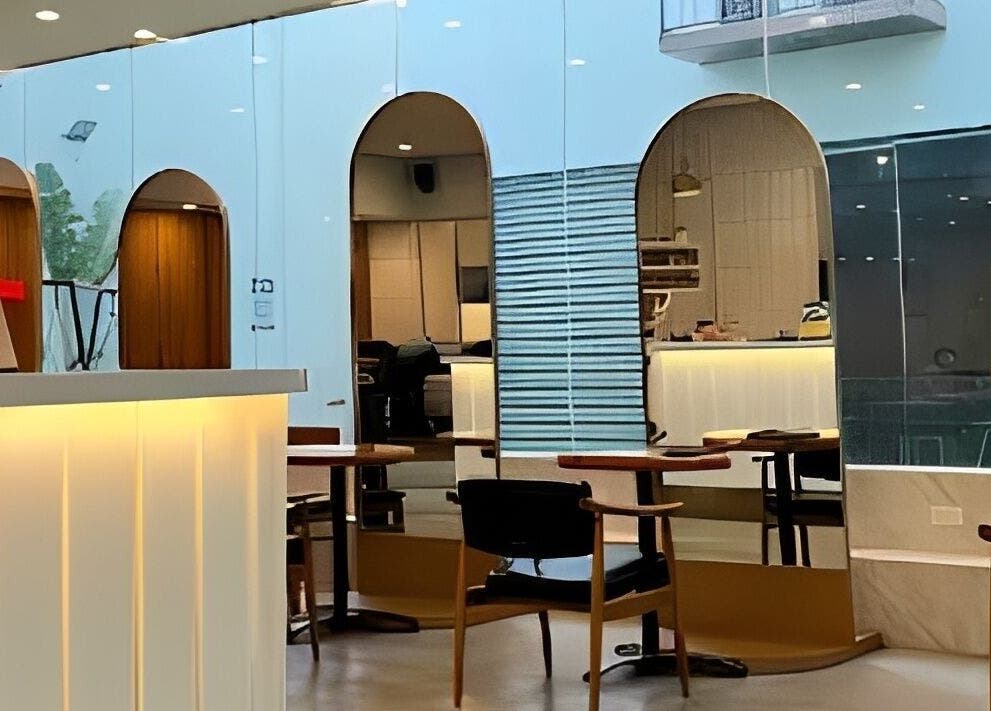 Modern interior of Rinoa Japanese Hair Salon in Cebu City, Central Visayas, PH with elegant arches and seating.