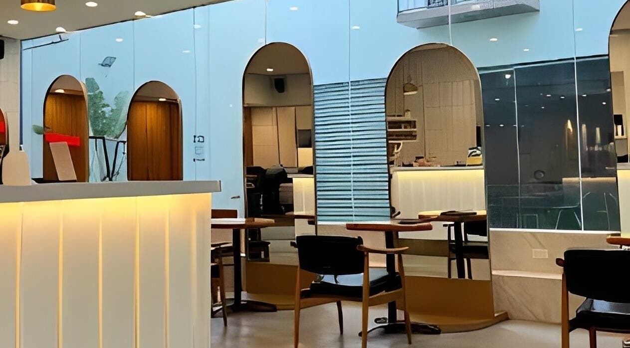 Modern interior of Rinoa Japanese Hair Salon in Cebu City, Central Visayas, PH with elegant arches and seating.