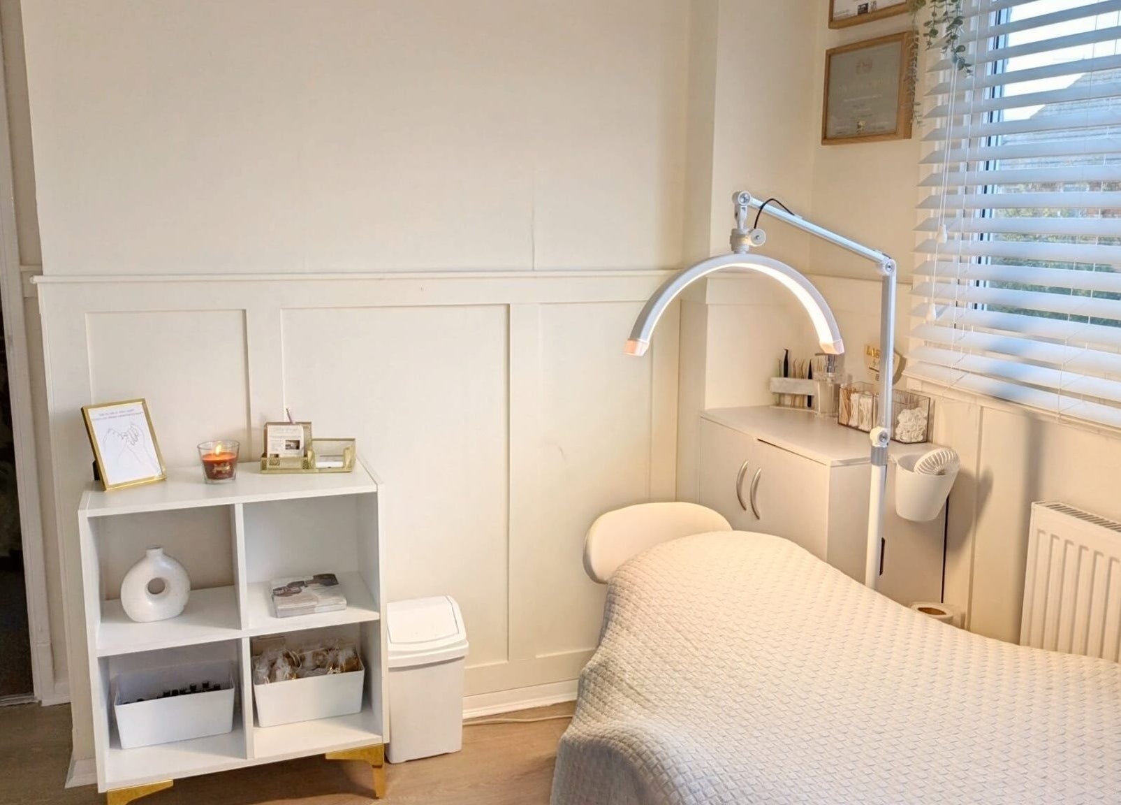 Calm treatment room at Bespoke Brows & Lashes in Havant, England, GB with a bed and soft lighting.