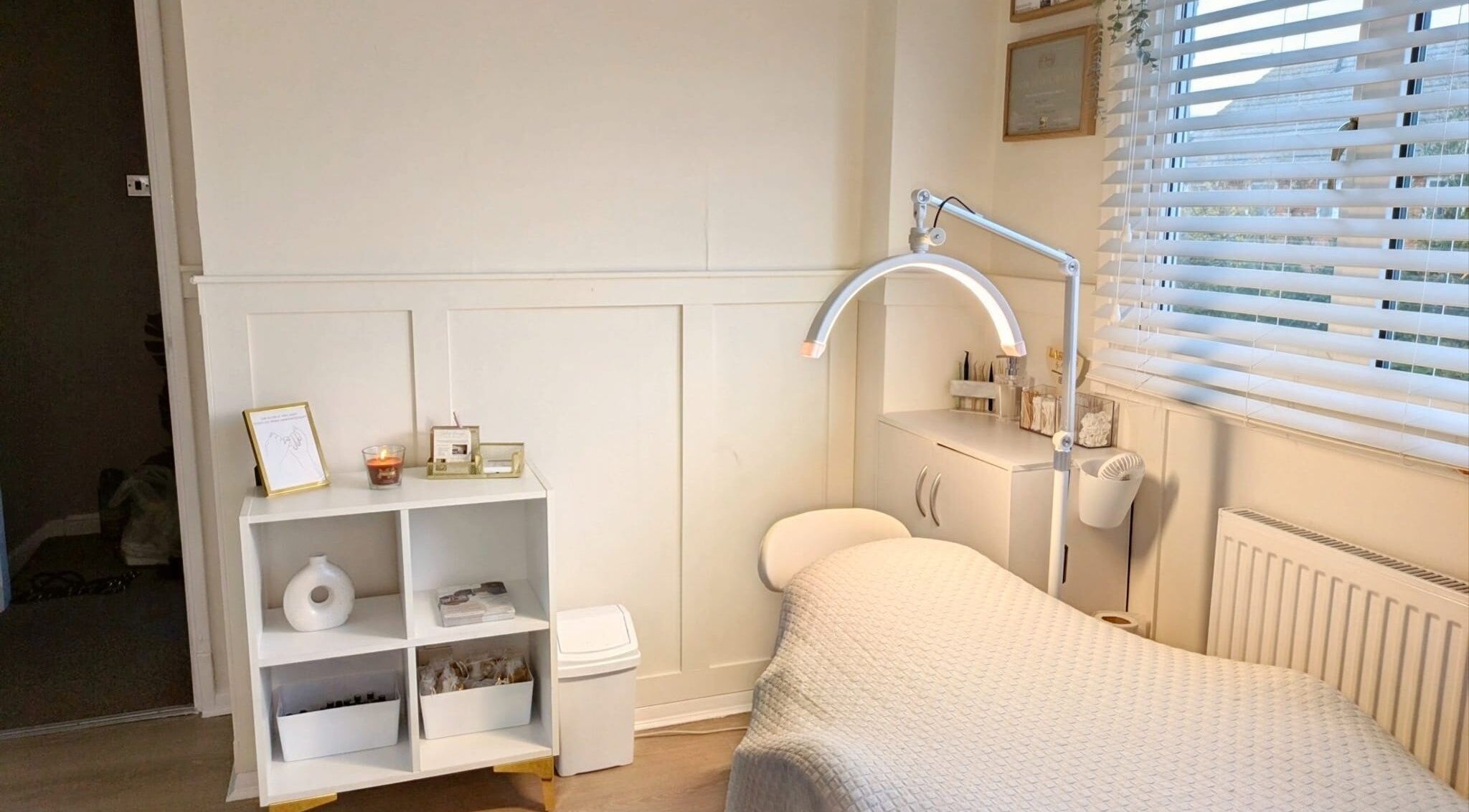 Calm treatment room at Bespoke Brows & Lashes in Havant, England, GB with a bed and soft lighting.