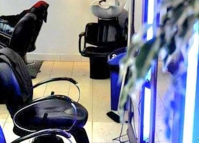 Modern interior of Daniel and Andrew Salon in Dublin, County Dublin, IE featuring stylish chairs and washing stations.