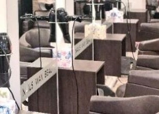 Chic styling chairs and hairdryers at Daniel and Andrew Salon, Dublin, County Dublin, IE.