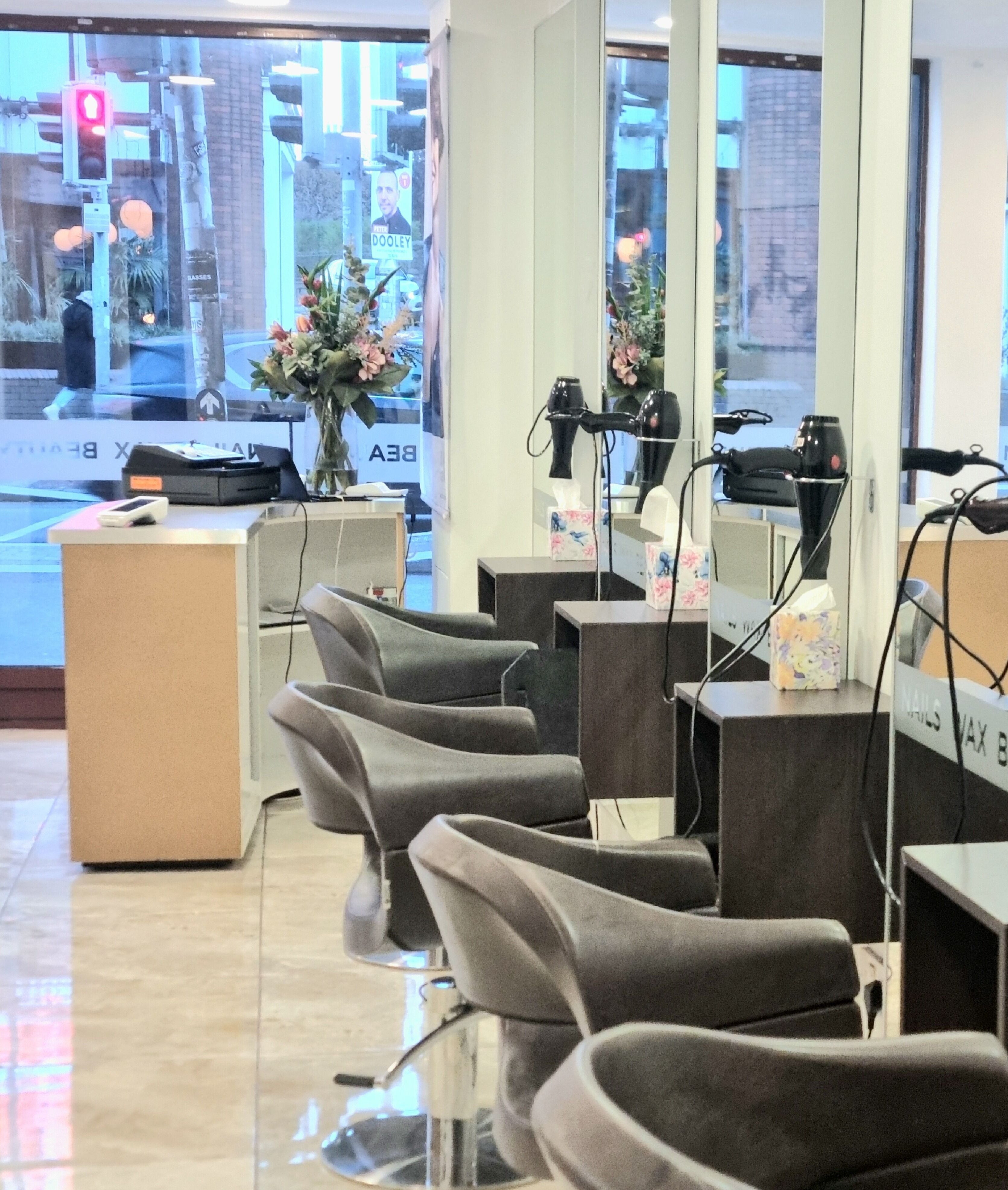 Stylish interior of Daniel and Andrew Salon in Dublin, County Dublin, IE, featuring sleek chairs and decor.