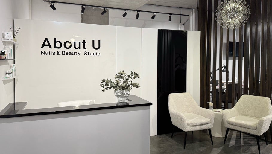Chic reception area at About U Nails & Beauty Studio, South Melbourne, Victoria, AU, with modern decor.