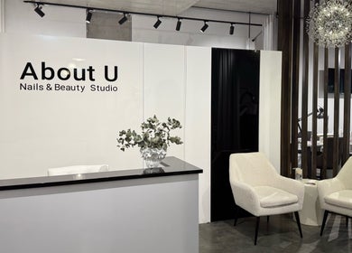 Chic reception area at About U Nails & Beauty Studio, South Melbourne, Victoria, AU, with modern decor.