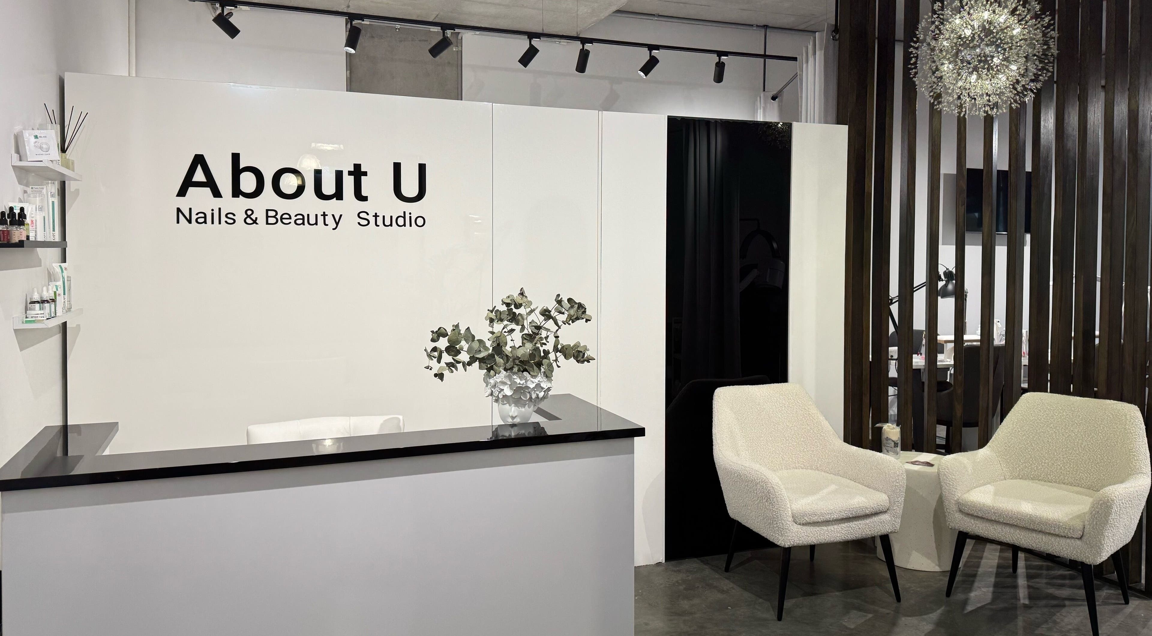 Chic reception area at About U Nails & Beauty Studio, South Melbourne, Victoria, AU, with modern decor.