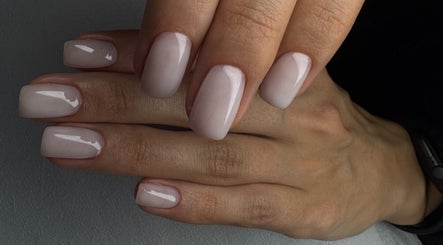 Elegant nude manicure at About U Nails & Beauty Studio, South Melbourne, Victoria, AU showcasing polished nails.