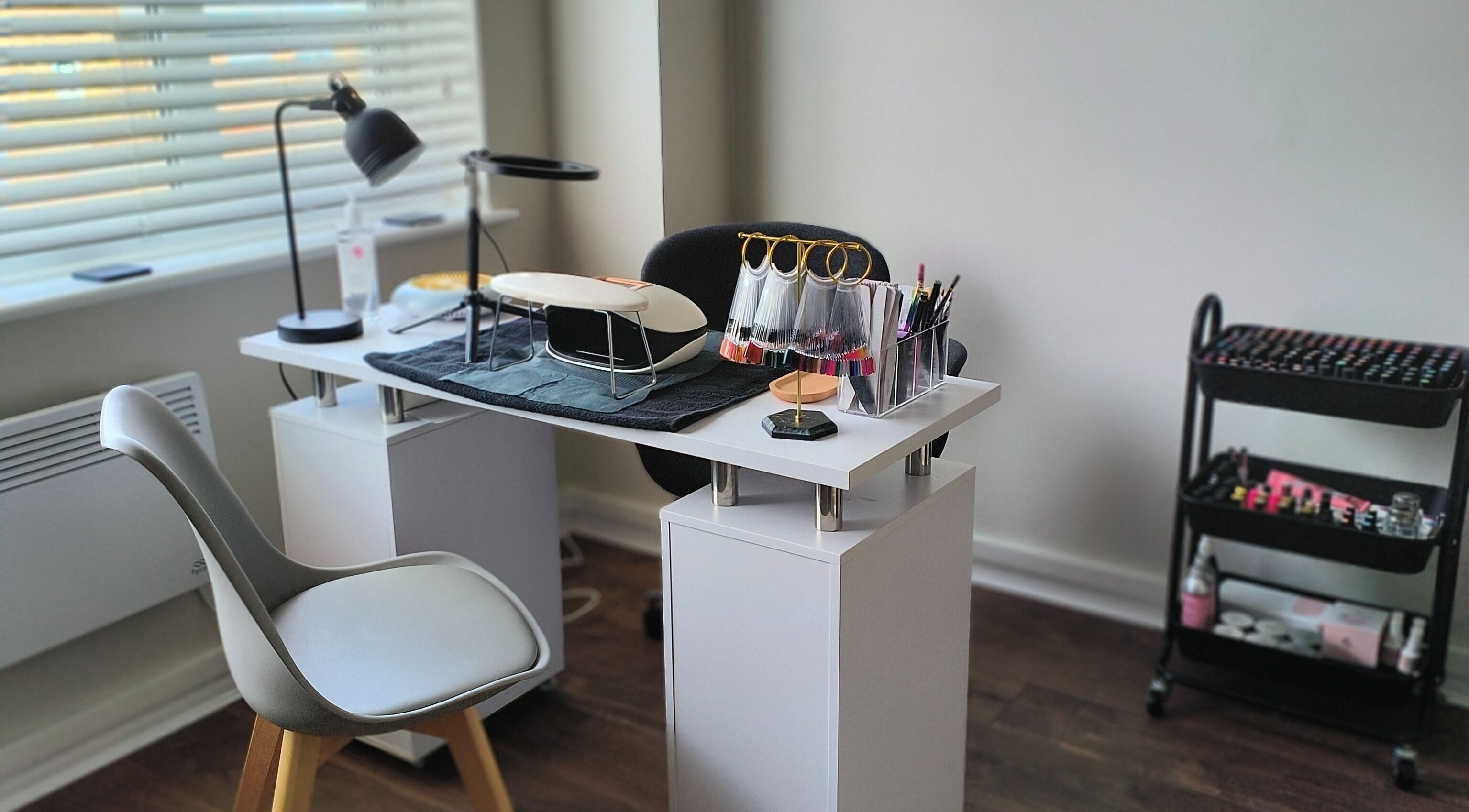 Chic nail workstation at Foxes Beauty Room New You, Clacton-on-sea, England, GB, showcasing nail accessories.