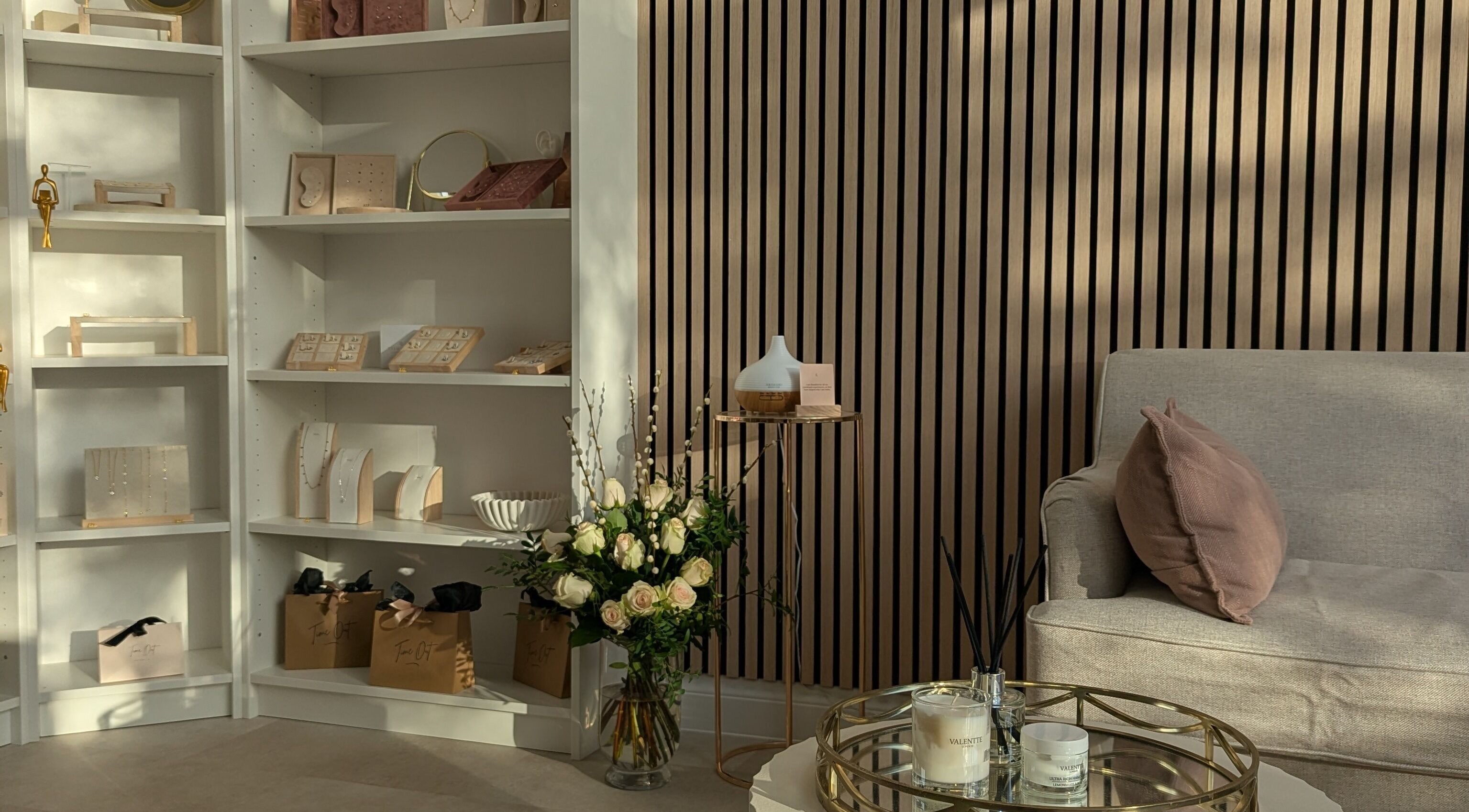 Calming corner at Time Out Beauty, Piercing & Aesthetics, Godalming, England, showcasing elegance and style.