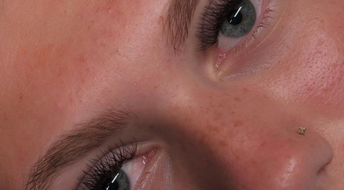 Close-up of well-groomed eyebrows and skin at Pretty & Perfect, Hampton, New Jersey, US.