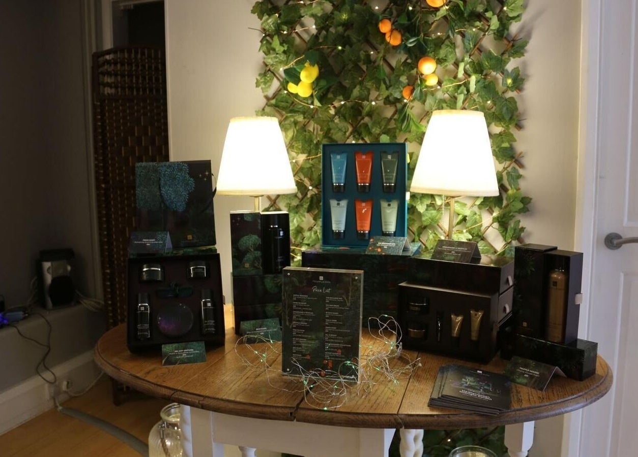 Product display at Clowance Spa in Camborne, England, featuring organic skincare products and elegant lighting.