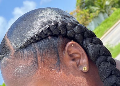 Sleek braided hairstyle at Hair Affairs 246, Bridgetown, Saint Michael, BB.