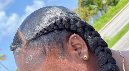Sleek braided hairstyle at Hair Affairs 246, Bridgetown, Saint Michael, BB.