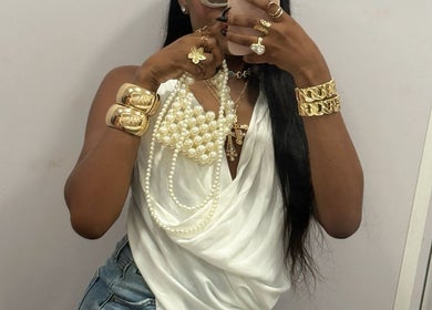 Elegant woman in gold jewelry at Hair Affairs 246, Bridgetown, Saint Michael, BB.