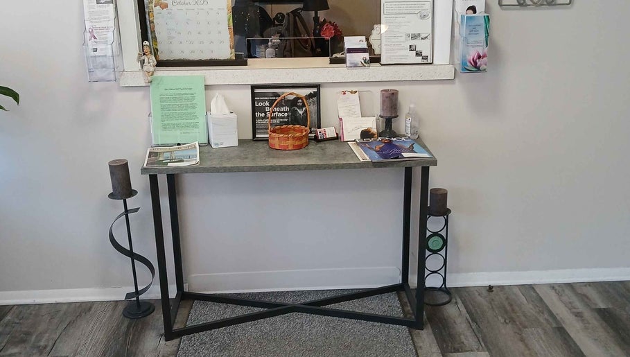 Reception area at Skin Solutions & Soft Touch Electrolysis with Zailey, Mansfield, Ohio, US, featuring decor and magazines.