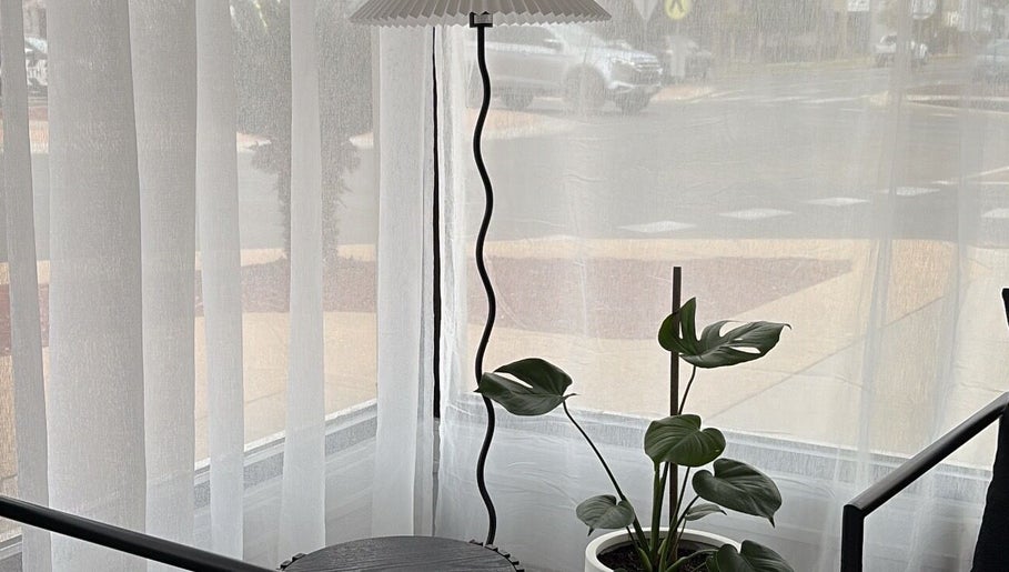 Elegant interior with lamp and plant at Beauty by Teah, Mildura, Victoria, AU.