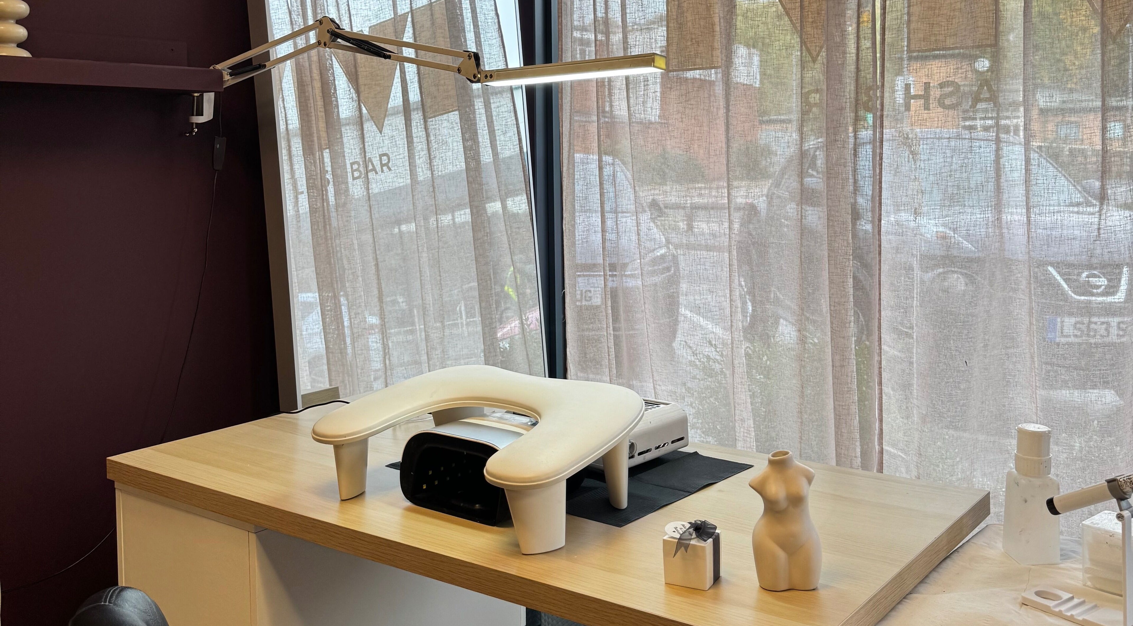 Luxury nail station at Brahmaloka, High Wycombe, England, GB with modern decor and elegant lighting.