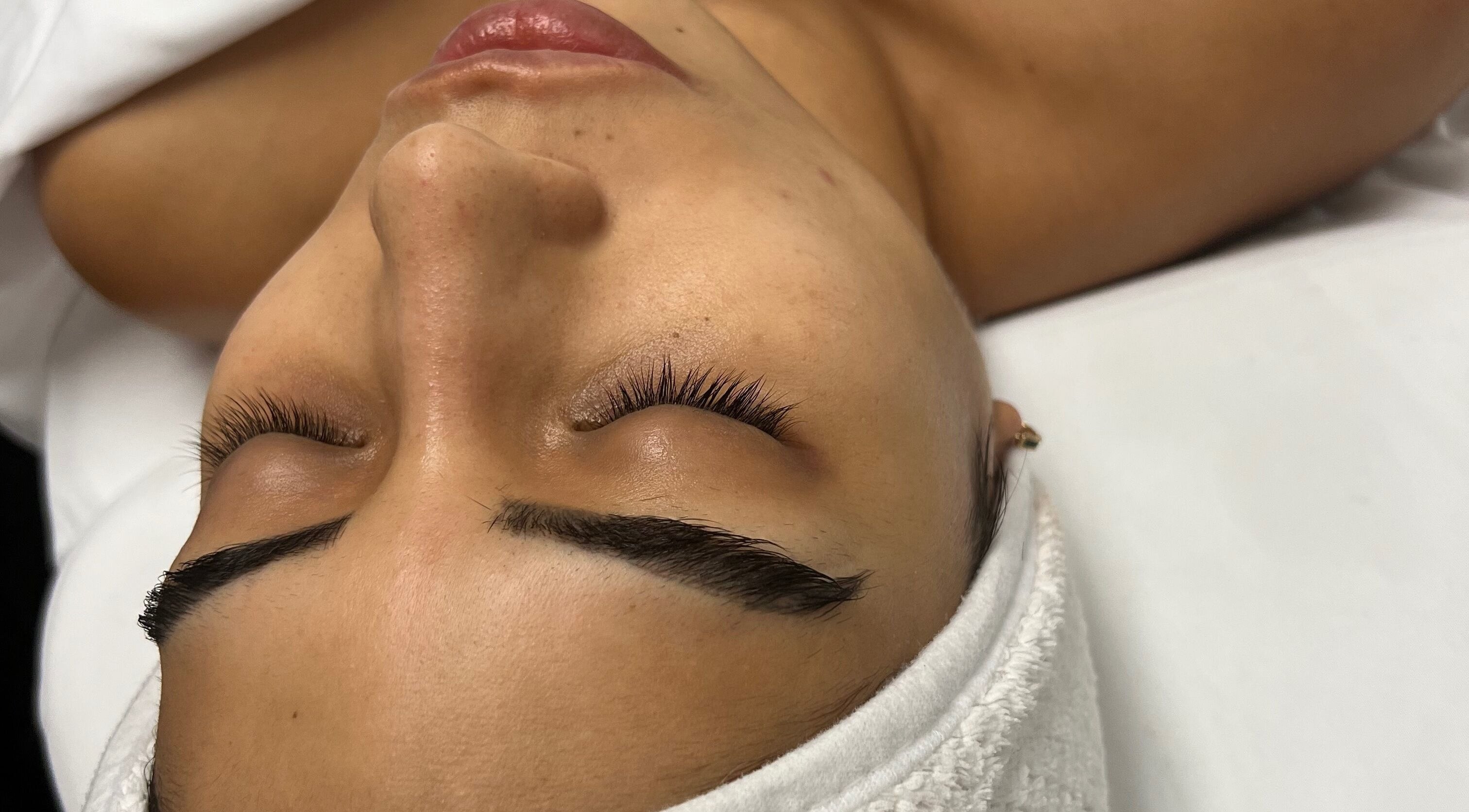 Relaxing facial treatment at ABY SKIN CARE, New York, New York, US, highlighting clean, restful skin.