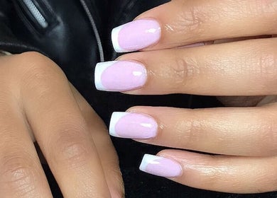 Chic French manicure with pink polish at Urban Edge Health & Beauty, Pretoria, Gauteng, ZA.