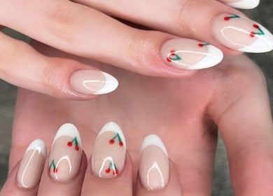Elegant cherry nail art at Urban Edge Health & Beauty, Pretoria, Gauteng, ZA. Perfect manicure inspiration.