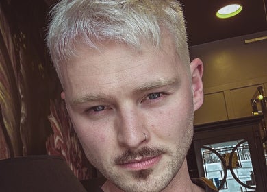 Blonde hairstyle at Joseph Rotchford Hair, Harrogate, England, GB with a modern salon backdrop.