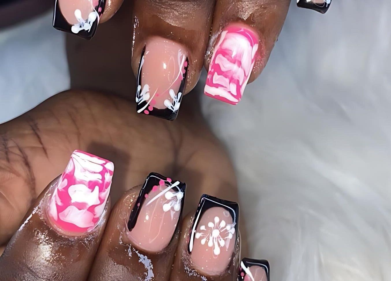 Intricate pink and black nail art from Beauty by Dior in Saint James, Saint James, BB.