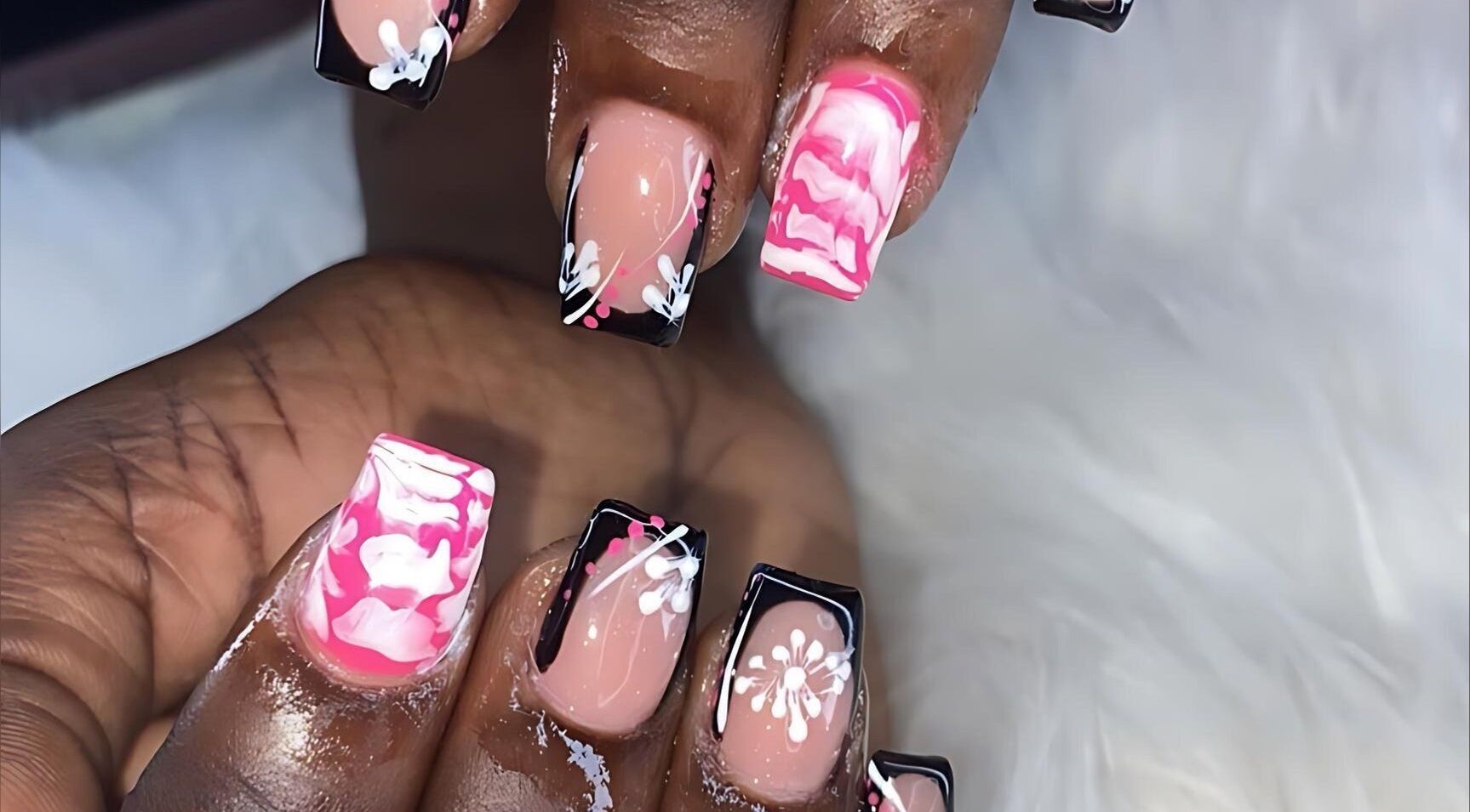 Intricate pink and black nail art from Beauty by Dior in Saint James, Saint James, BB.