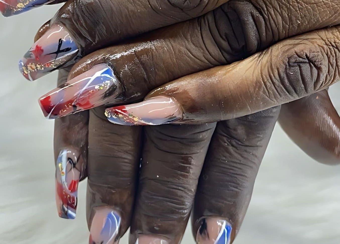 Stunning nail art at Beauty by Dior, Saint James, BB, featuring intricate designs with vibrant colors.