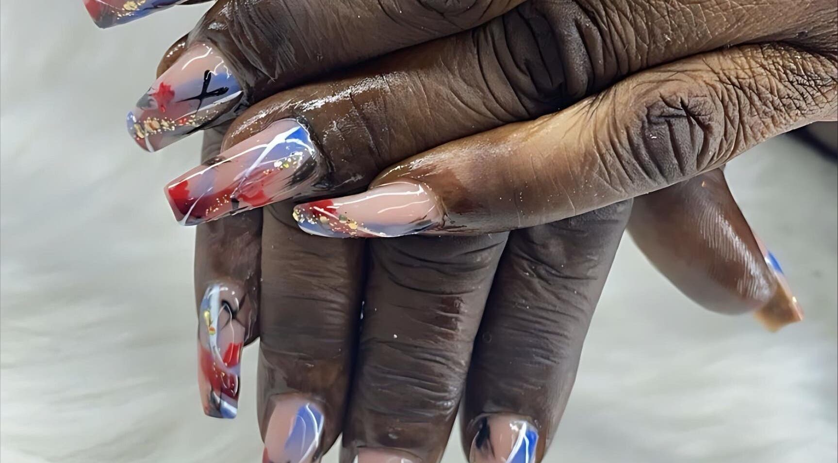 Stunning nail art at Beauty by Dior, Saint James, BB, featuring intricate designs with vibrant colors.