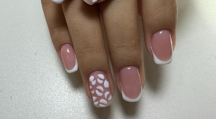 Elegant French manicure with white tips from Nailina Ny, Scarsdale, New York, US.
