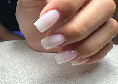 Stylish ombré manicure at Nailina Ny, Scarsdale, New York, US showcasing glossy, expertly finished nails.
