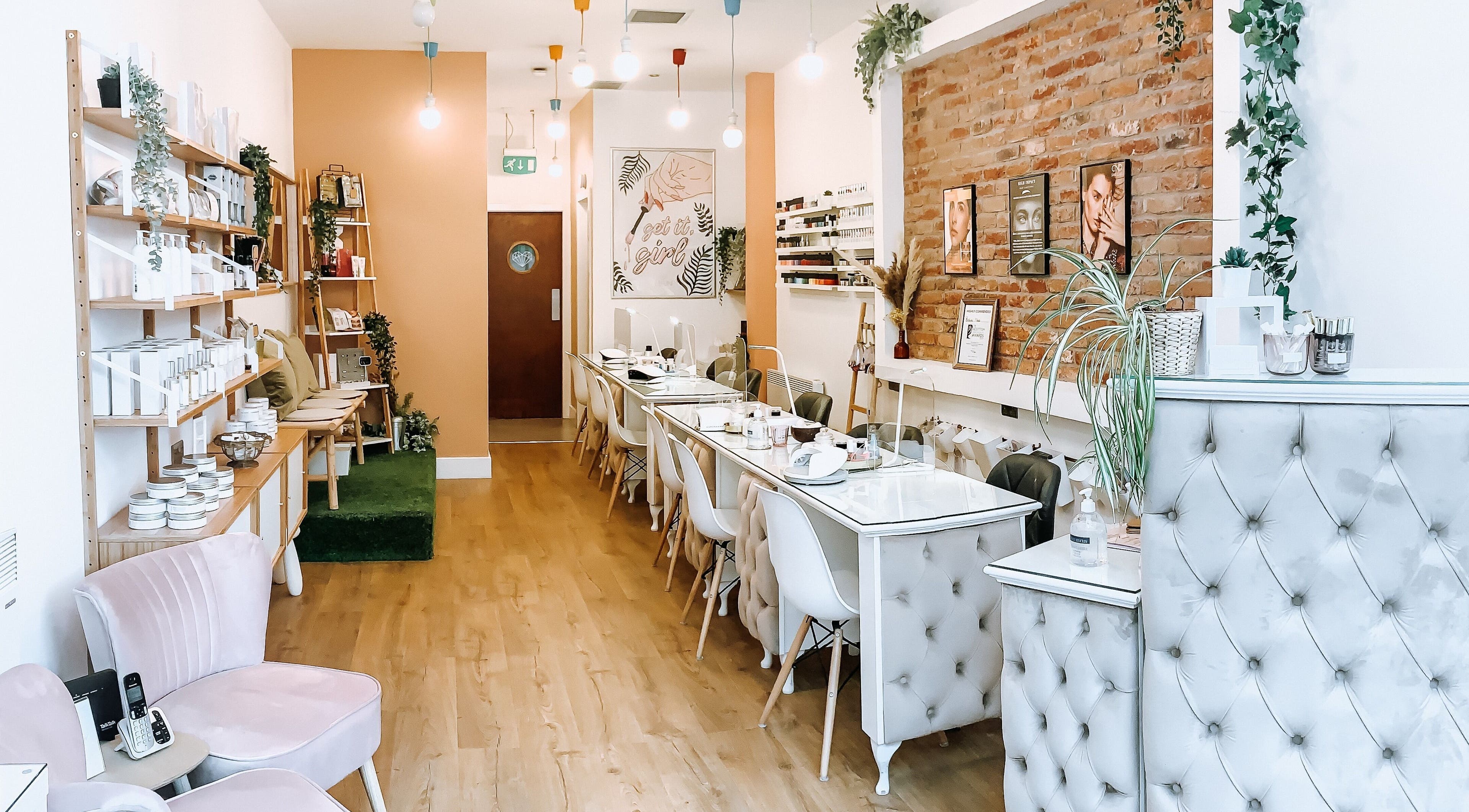 Interior of Bellini Nails and Beauty in Glasgow, Scotland, GB. Elegant nail salon with cozy seating and stylish decor.