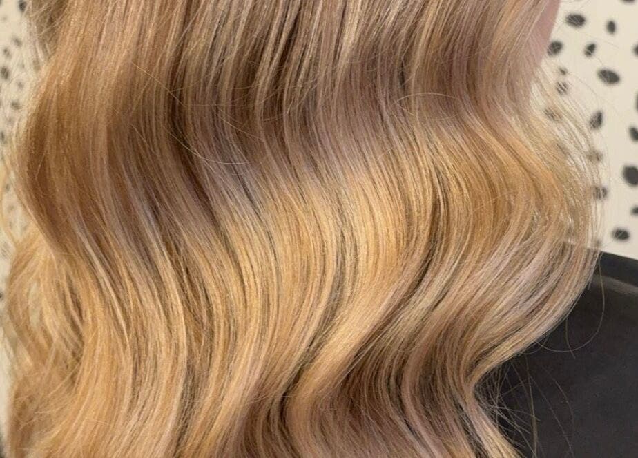 Elegant golden waves styled at Justine’s Hair and Barbering in Elgin, Scotland, GB.
