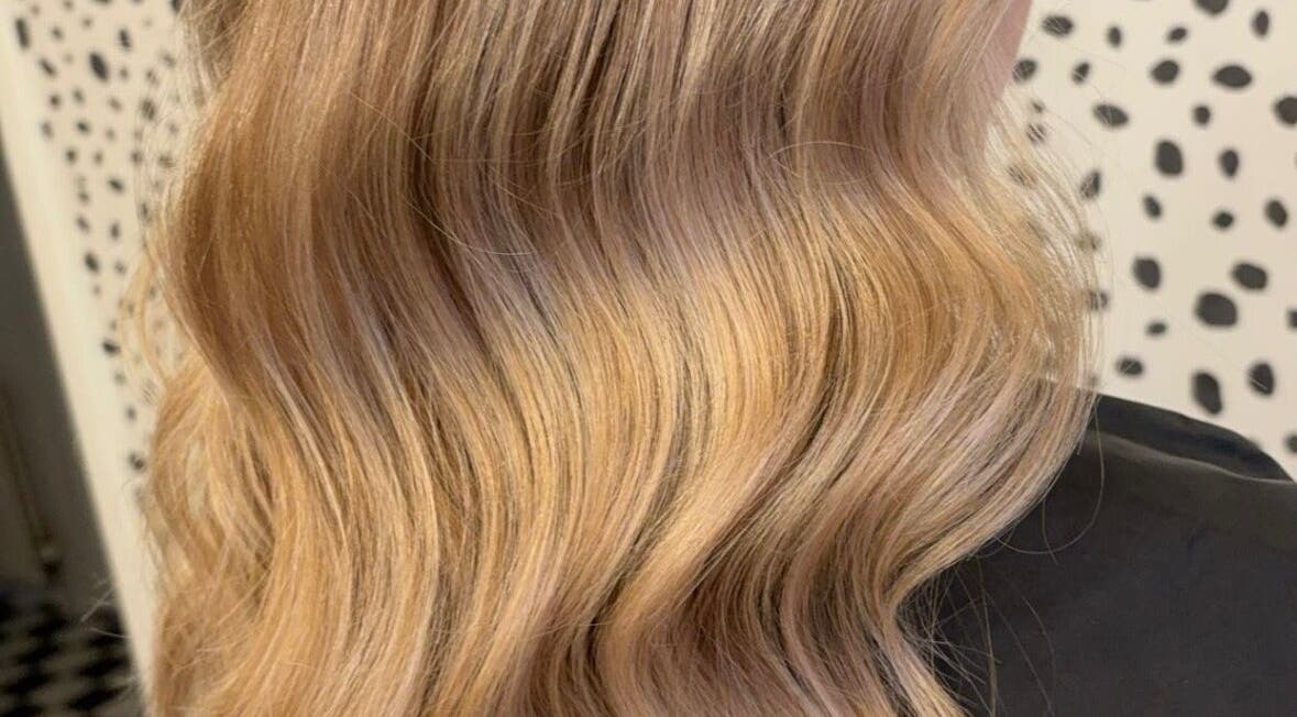 Elegant golden waves styled at Justine’s Hair and Barbering in Elgin, Scotland, GB.