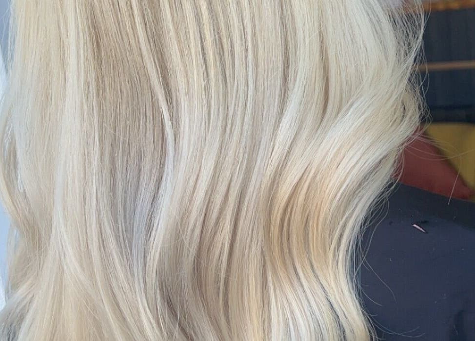 Elegant blonde waves styled at Justine’s Hair and Barbering, Elgin, Scotland, GB.