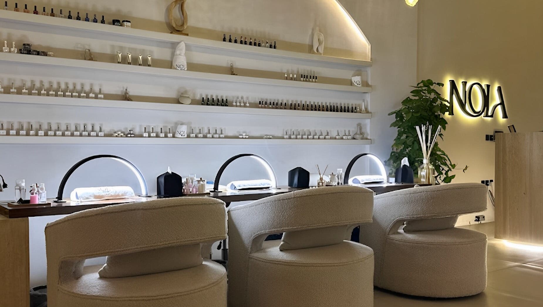 Chic interior of Nola Head Spa and Salon in Riyadh, Riyadh Province, SA featuring modern chairs and decor.