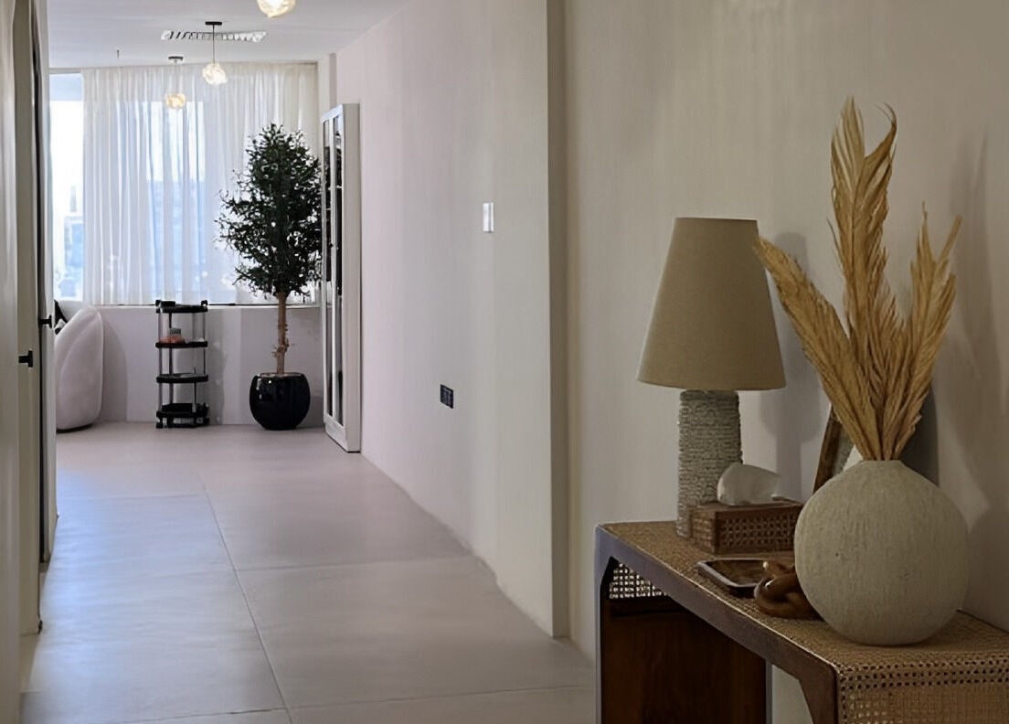 Elegant hallway at Nola Head Spa and Salon, Riyadh, Riyadh Province, SA, featuring stylish decor and soft lighting.