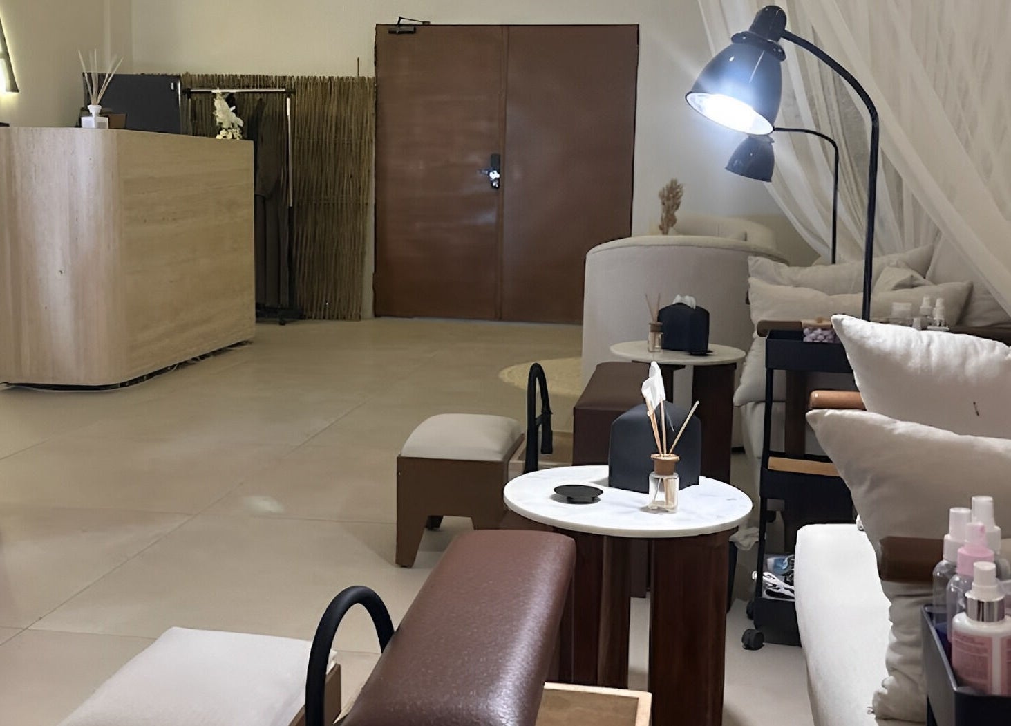 Peaceful interior of Nola Head Spa and Salon in Riyadh, Riyadh Province, SA, featuring cozy seating and ambient lighting.