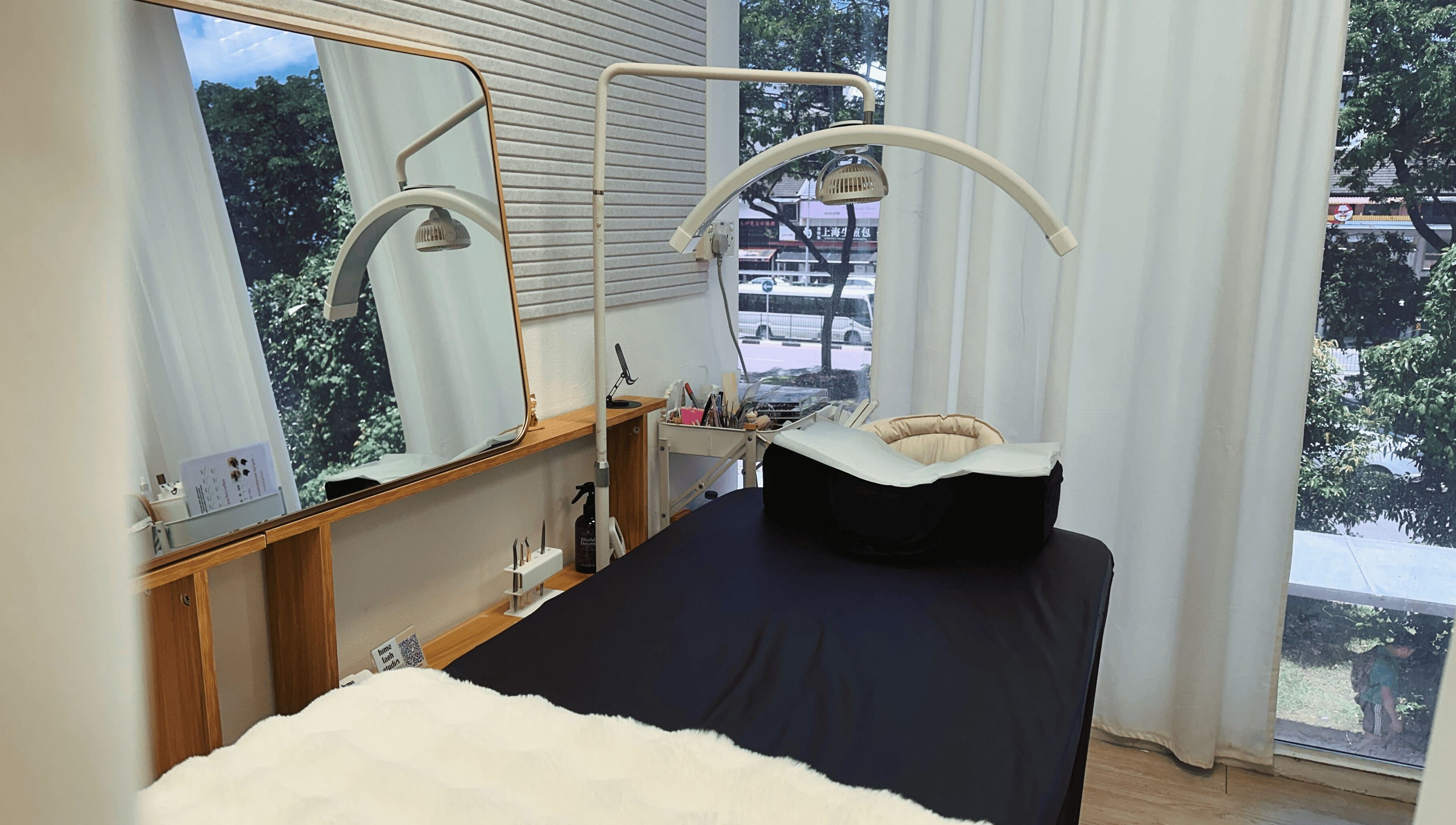 Hime Studio / He Mēi “姫”, Singapore, SG. A tranquil treatment room with a comfy bed and large mirror.