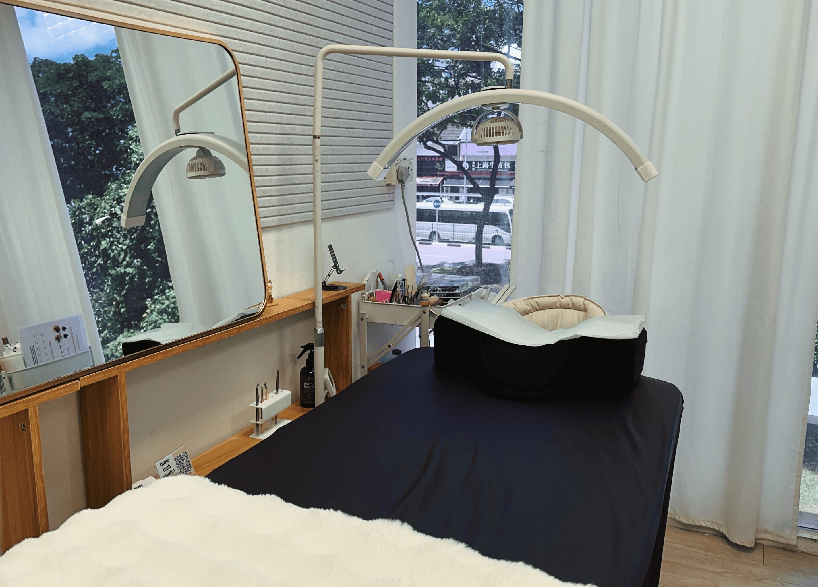 Hime Studio / He Mēi “姫”, Singapore, SG. A tranquil treatment room with a comfy bed and large mirror.