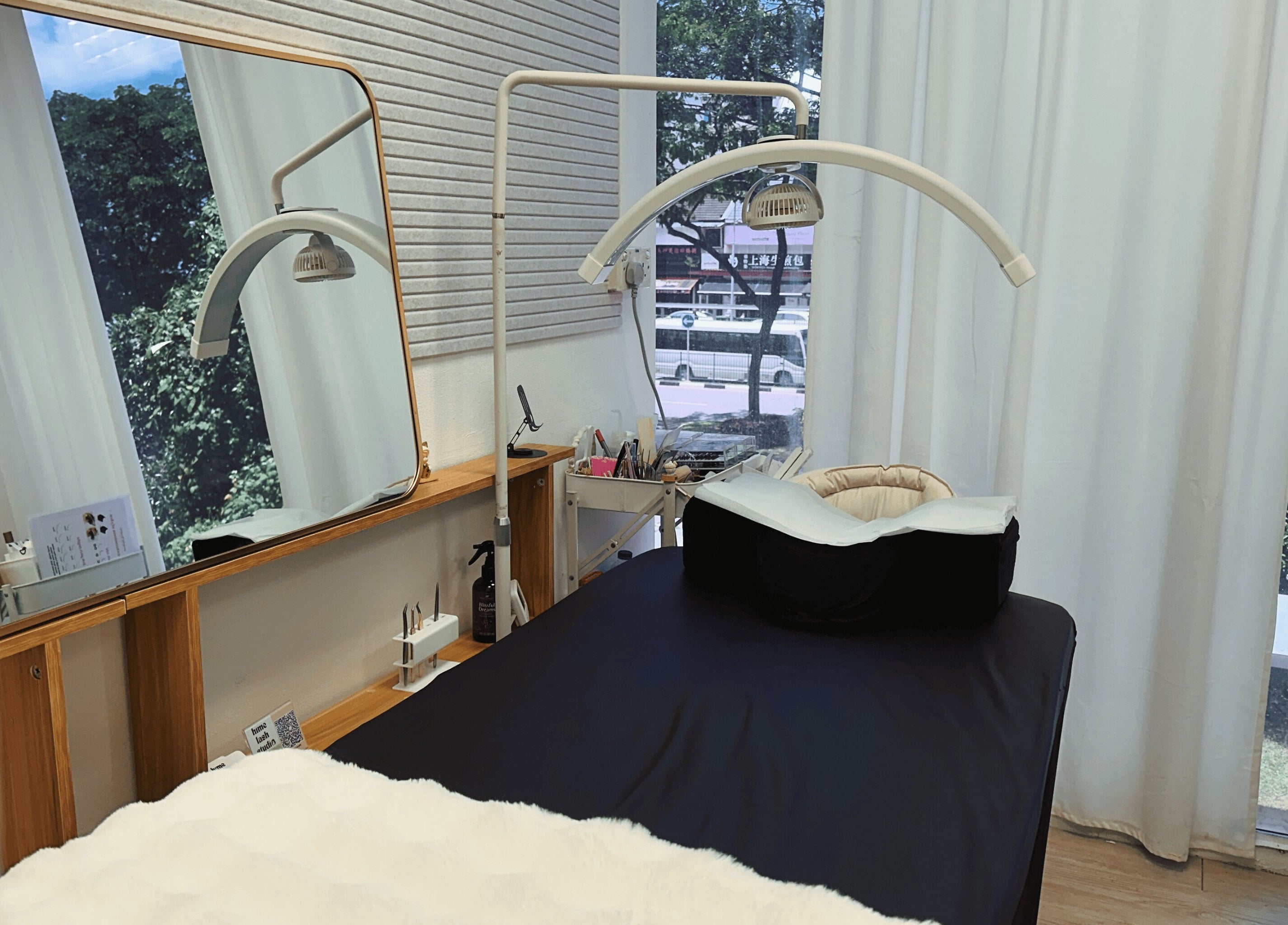 Hime Studio / He Mēi “姫”, Singapore, SG. A tranquil treatment room with a comfy bed and large mirror.