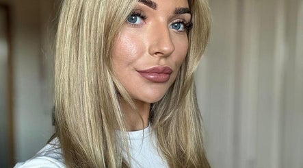 Close-up of a woman with flawless skin, highlighting beauty at Enhanced Aesthetics Scotland, Glasgow, Scotland, GB.