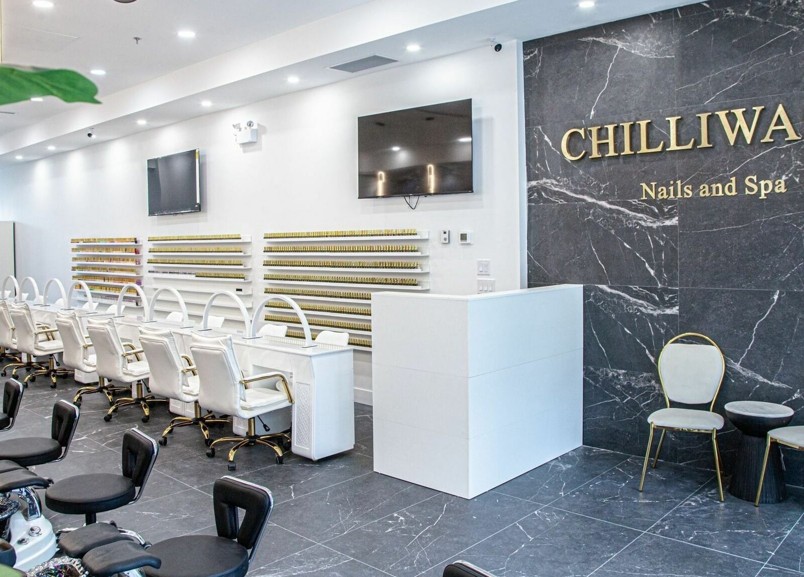 Chic interior of Chilliwack Nails in Chilliwack, British Columbia, CA featuring modern nail stations.