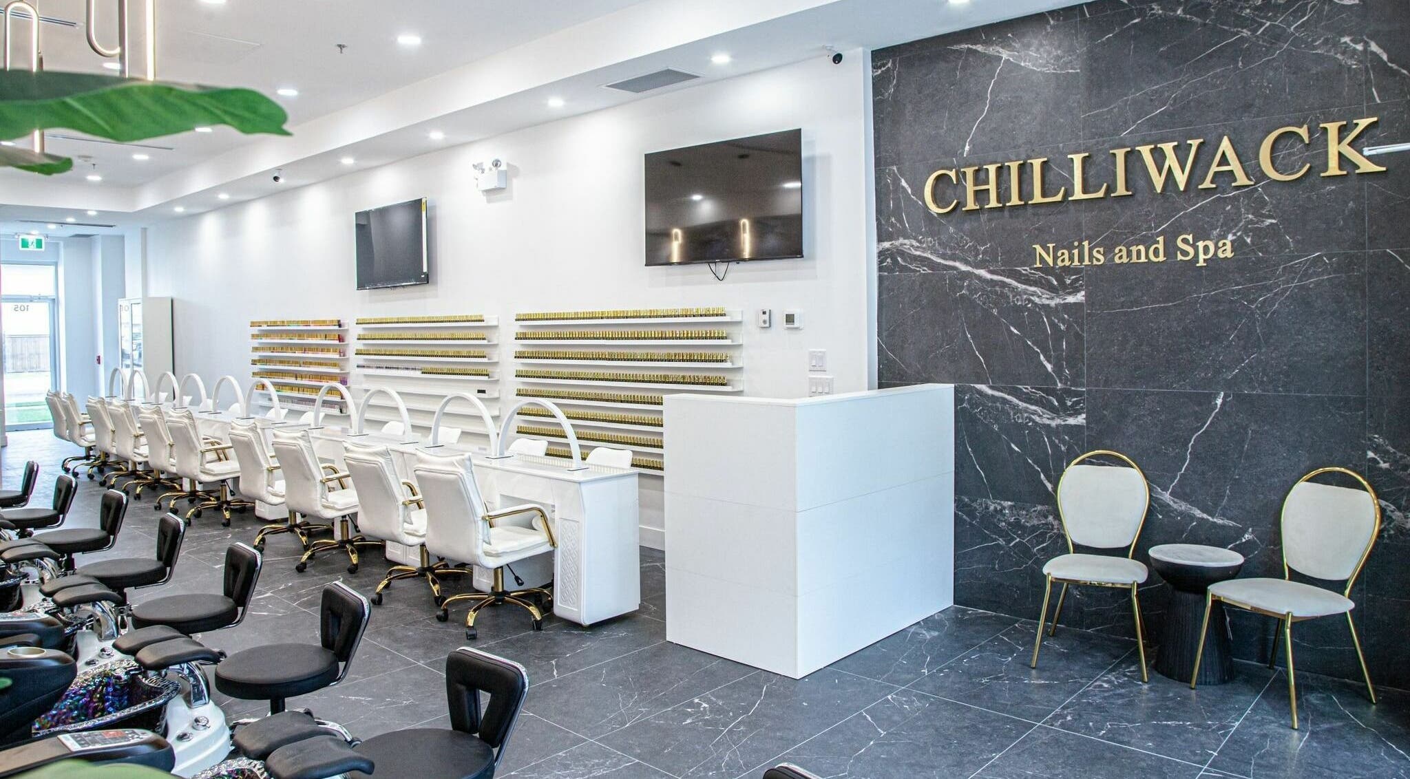 Chic interior of Chilliwack Nails in Chilliwack, British Columbia, CA featuring modern nail stations.