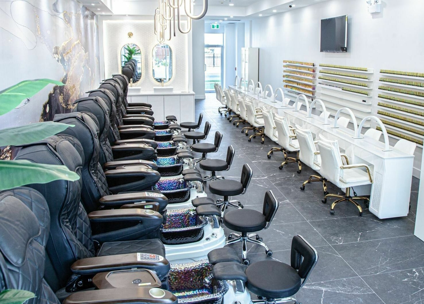 Chic interiors of Chilliwack Nails in Chilliwack, British Columbia, CA, featuring plush seating and modern decor.