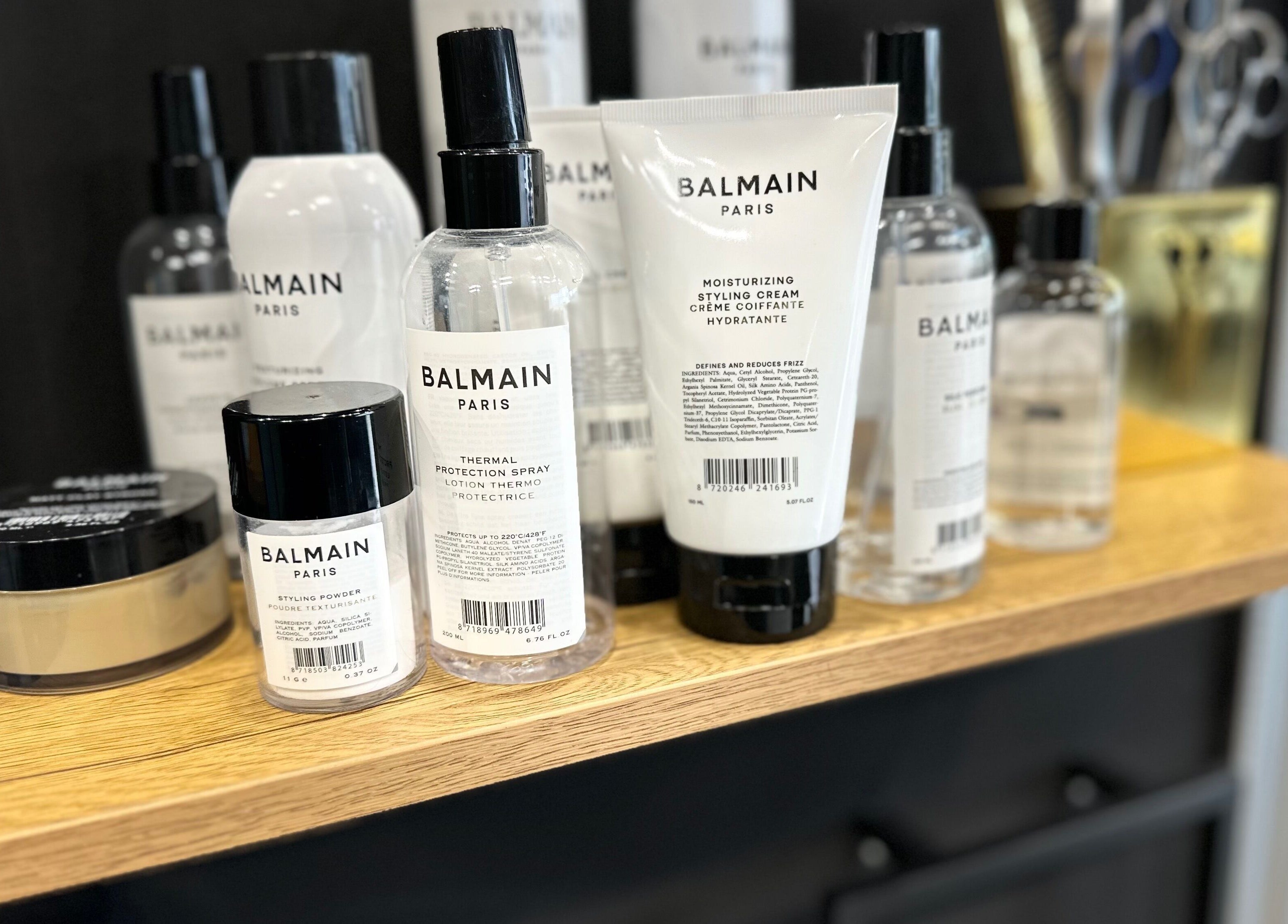 Луксозни продукти Balmain в Brillare by BM, София, Област София, BG на дървени рафтове.