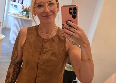 Person taking a mirror selfie at Thirteen Roses Piercing 🥀 Broxburn, Scotland, GB, showcasing interior decor.