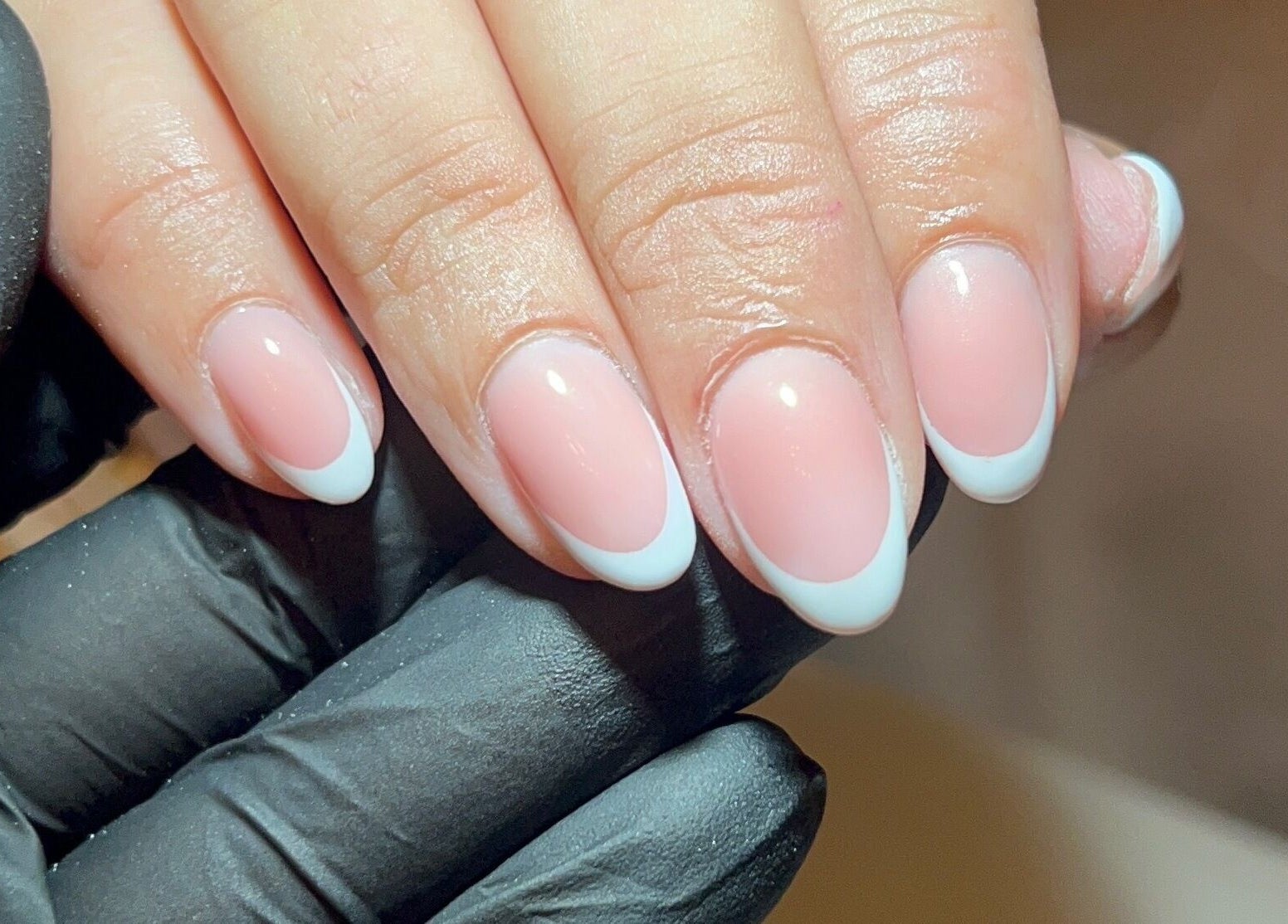 French manicure at Dunn Up By Alexandra in Middlesbrough, England, GB showcasing elegant oval nails.