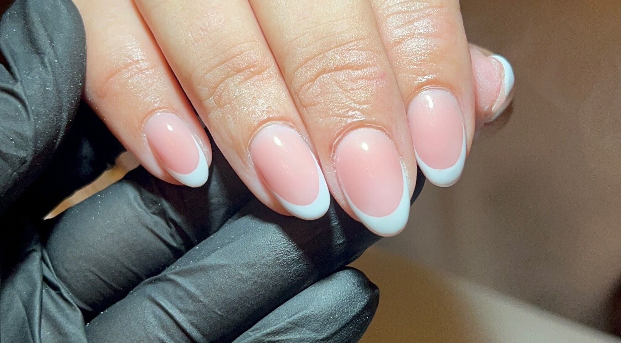 French manicure at Dunn Up By Alexandra in Middlesbrough, England, GB showcasing elegant oval nails.
