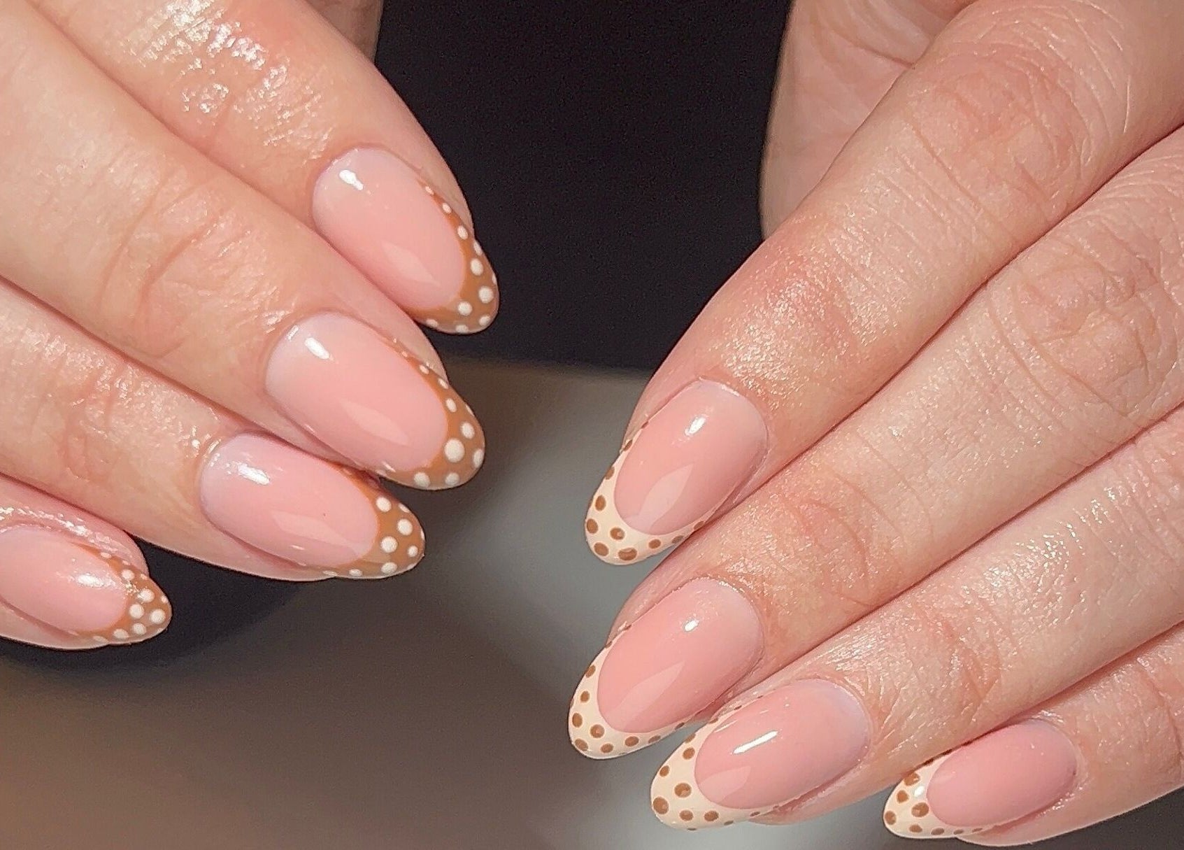 Polka dot nail art design at Dunn Up By Alexandra in Middlesbrough, England, GB, showcasing delicate craftsmanship.
